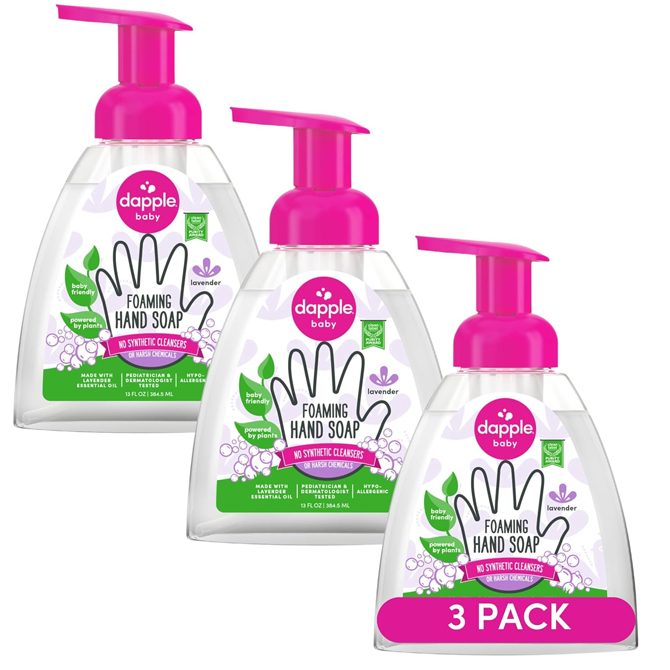 Three clear bottles with pink foaming soap pump lids.