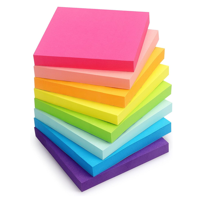 A stack of sticky notes is ordered according to rainbow colors.