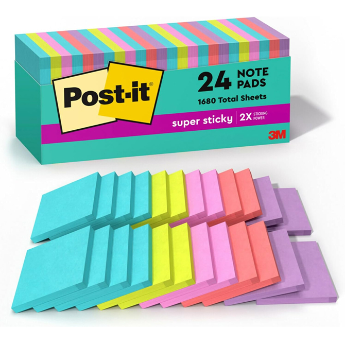 Multiple colored pads of sticky notes are laid out in front of a package of Post-it notes.