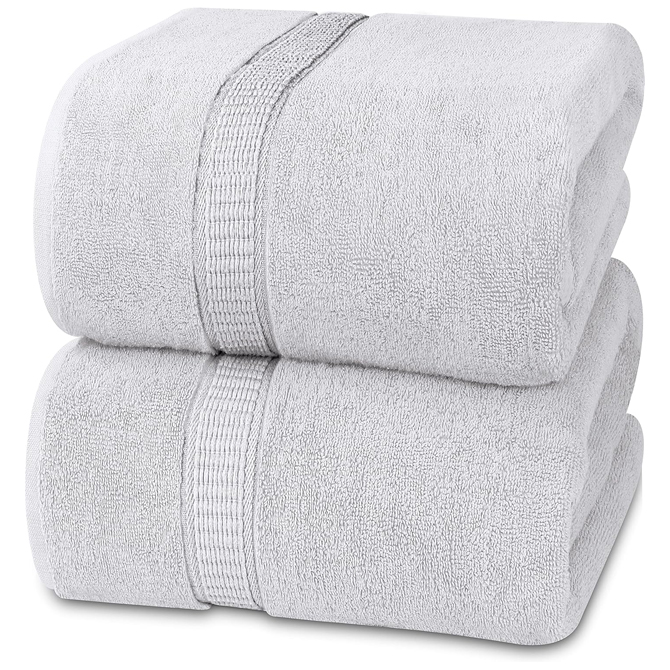 Stack of two white bath sheets.